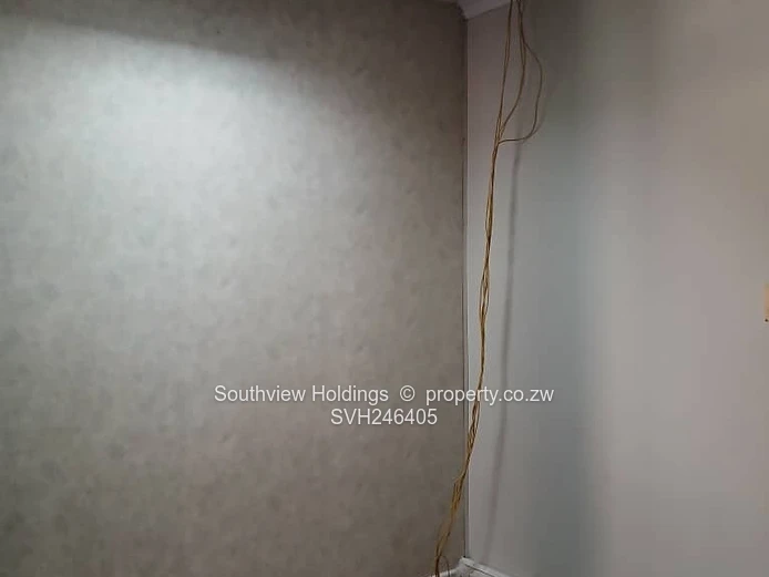 Neat office to let, Upper CBD. Gross rent USD210.00 per month.