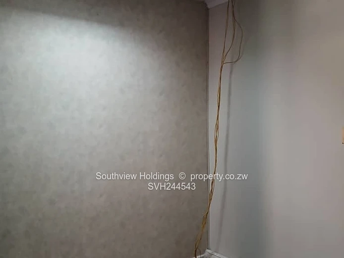 Neat office to let, Upper CBD. Gross rent USD210.00 per month.