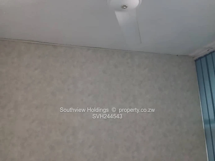 Neat office to let, Upper CBD. Gross rent USD210.00 per month.