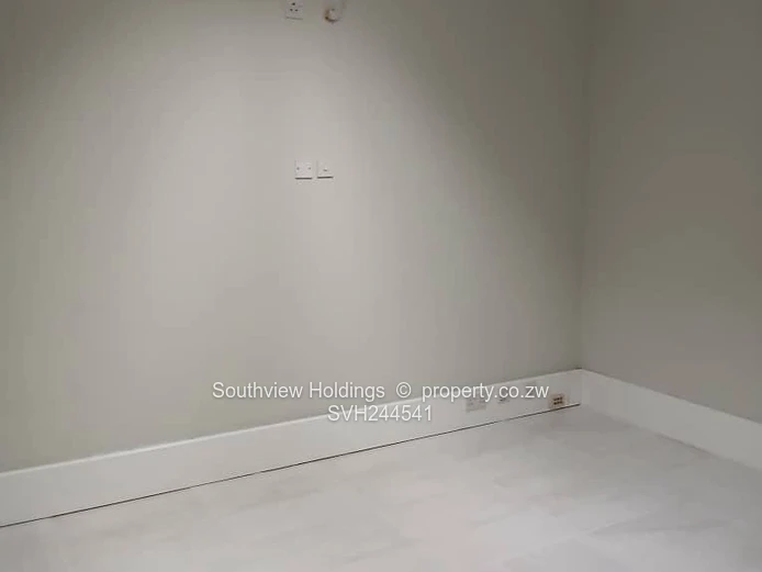 Neat office to let, Upper CBD. Gross rent USD260.00 per month.