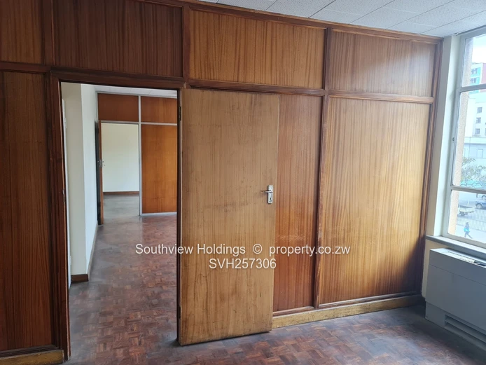 3 neat interconnecting offices plus strong room to let. 