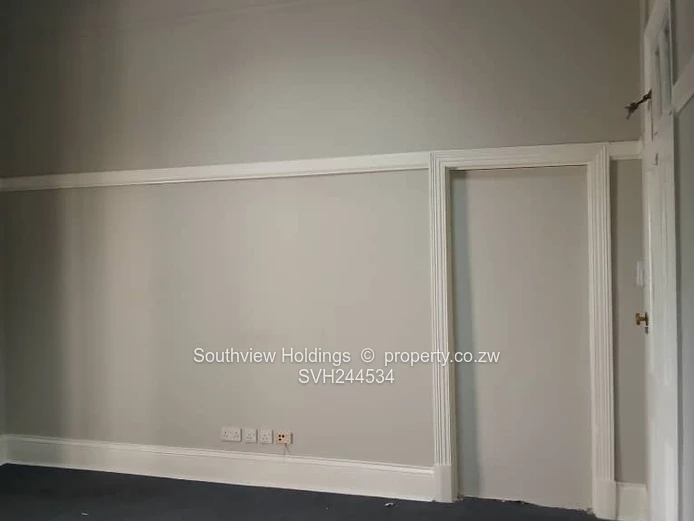 Neat office to let, Upper CBD. Gross rent USD415.00 per month.