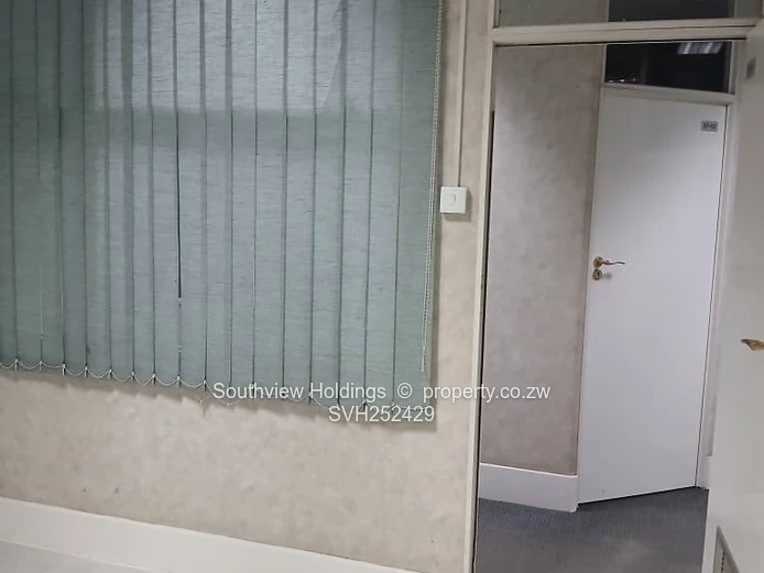 Neat office to let, Upper CBD. Gross rent USD215.00 per month.