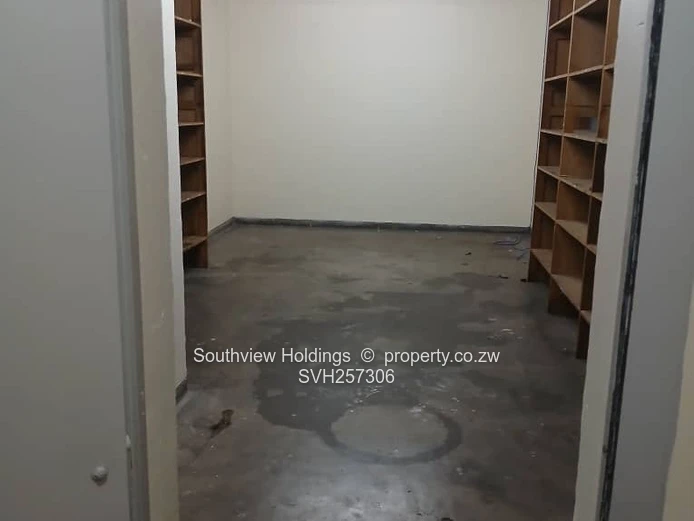 3 neat interconnecting offices plus strong room to let. 